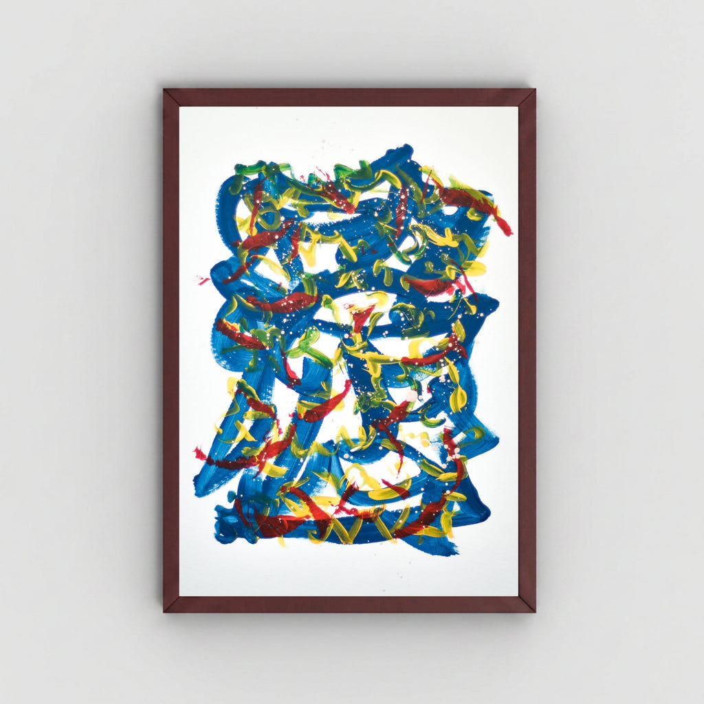 A framed abstract art featuring expressive, layered brushstrokes in blue, yellow, and red on a white background, enclosed in a dark brown wooden frame and mounted on a light gray wall.