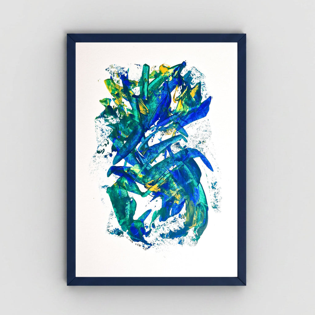 A framed abstract painting featuring expressive blue, green, and yellow brushstrokes on a white background, enclosed in a dark navy frame and displayed against a light gray wall.