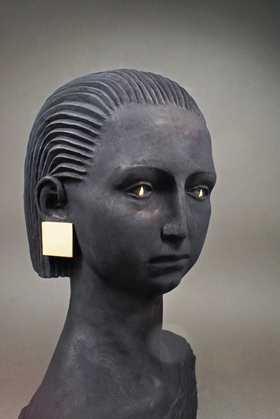 bronze sculpture of a woman in dark patina