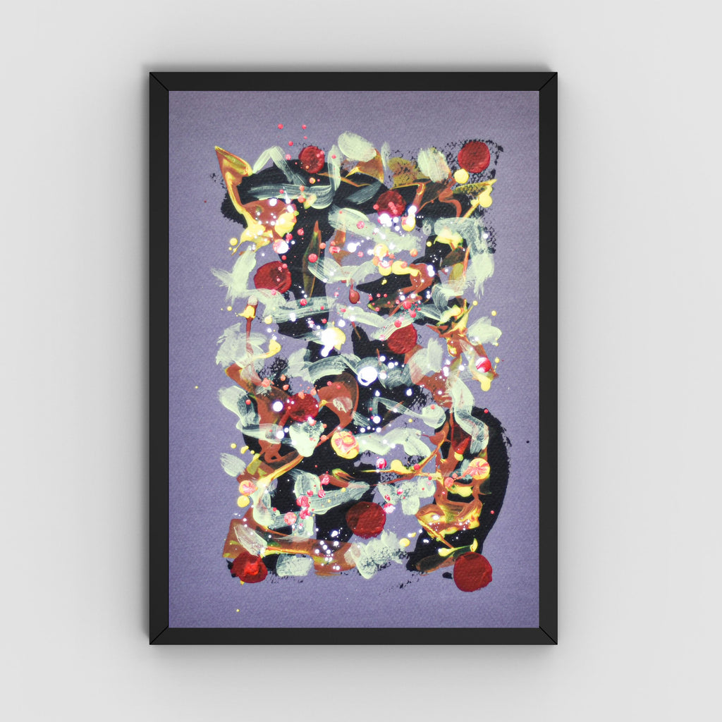 A framed abstract art featuring a colorful collage of red, white, black, and gold elements on a lavender-purple background, housed in a simple black frame and displayed against a light gray wall.