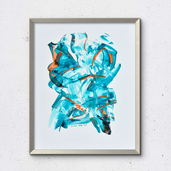 Framed abstract art with turquise and orange colors on a light gray background