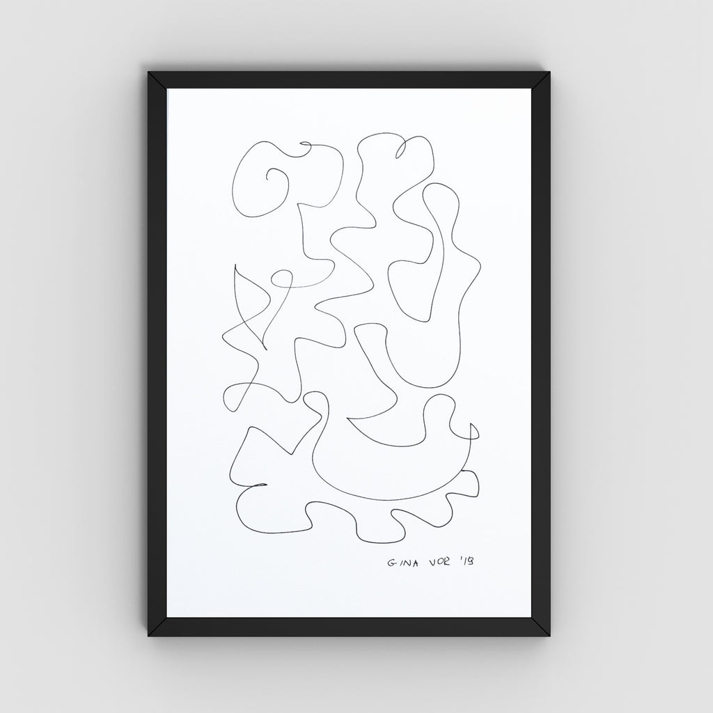 A framed minimalist black and white art featuring an abstract continuous line drawing on a white background, enclosed in a thin black frame against a light gray wall.