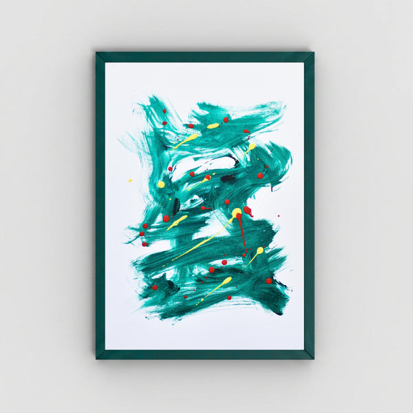 A framed abstract art featuring teal and green paint strokes with splatters of red, yellow, and black on a white background, housed in a dark green frame and mounted on a light gray wall.