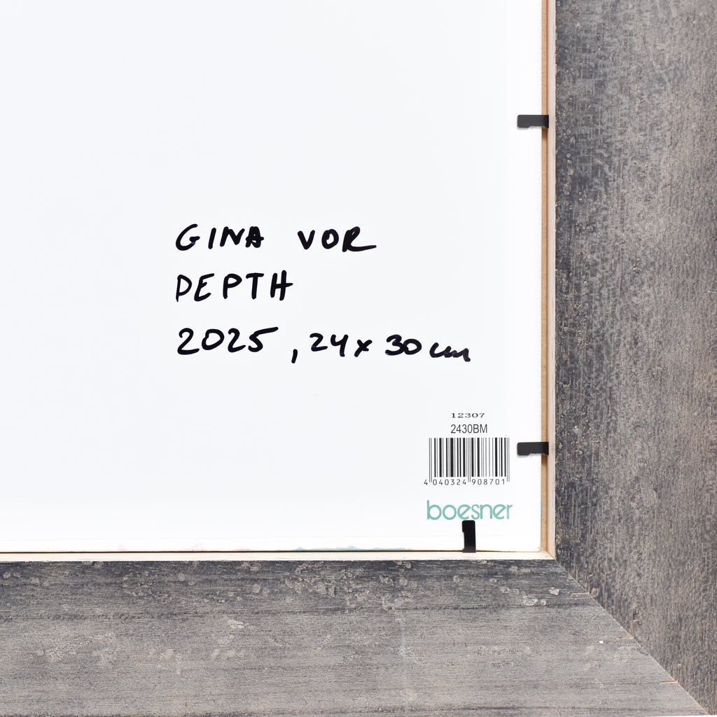 Framed artwork with text and a brand logo on a textured surface