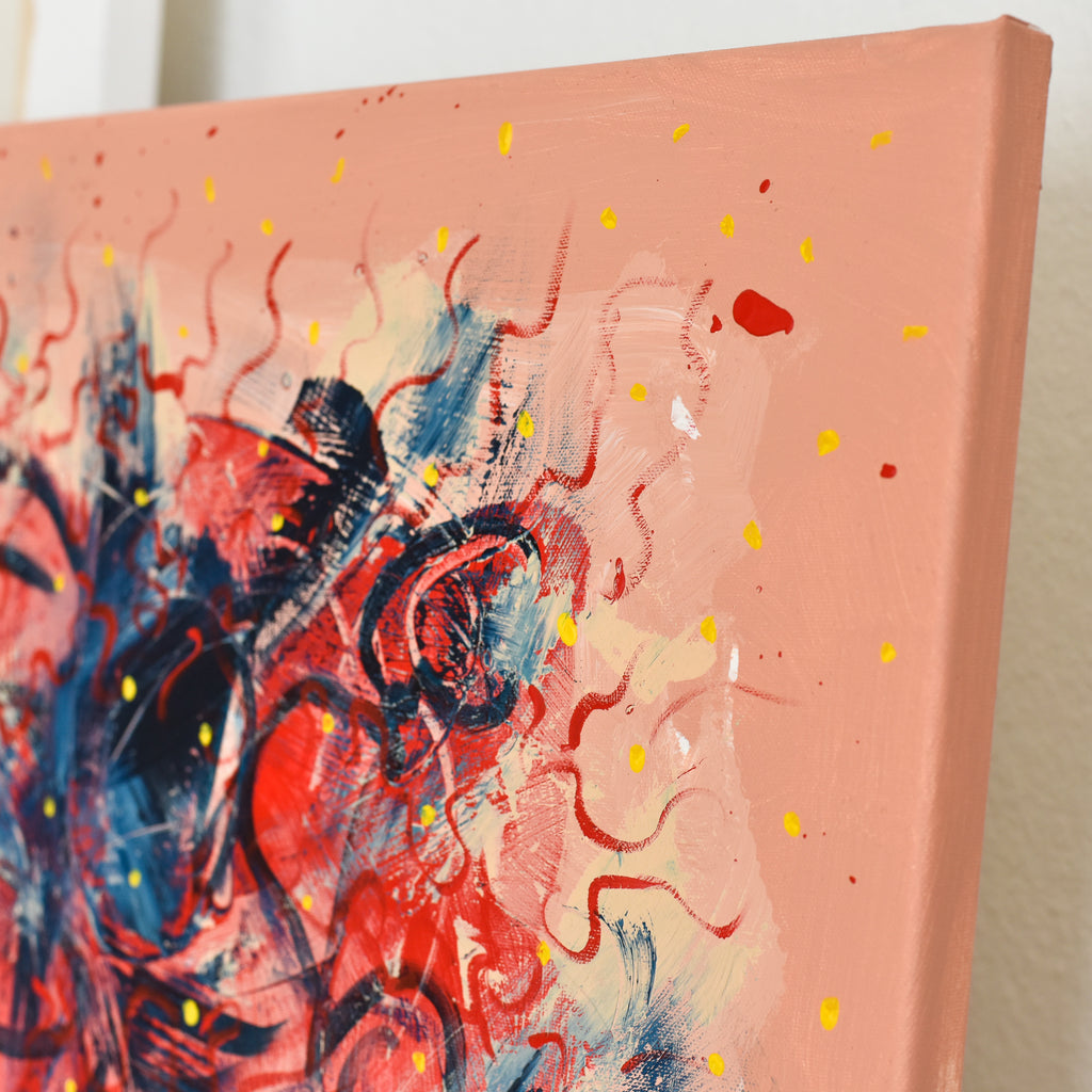 Large abstract painting by Gina Vor, titled Passion. The piece features sweeping strokes of red and blue, contrasted against a pale peach background with scattered yellow dots, capturing a sense of intense emotion.