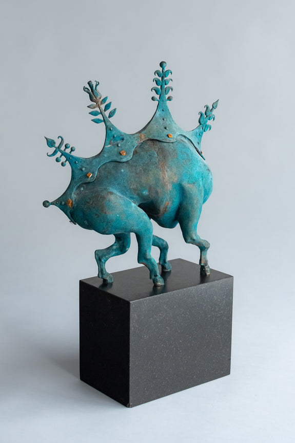 Webbed feet and a crown of fish hint at the aquatic nature of the Damavykas in this detailed bronze sculpture. 