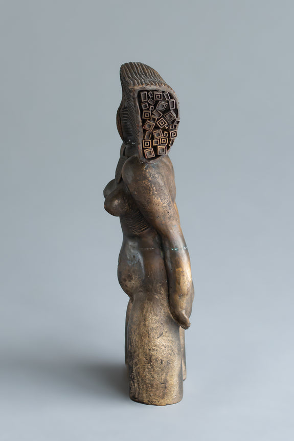bronze sculpture artwork of a woman