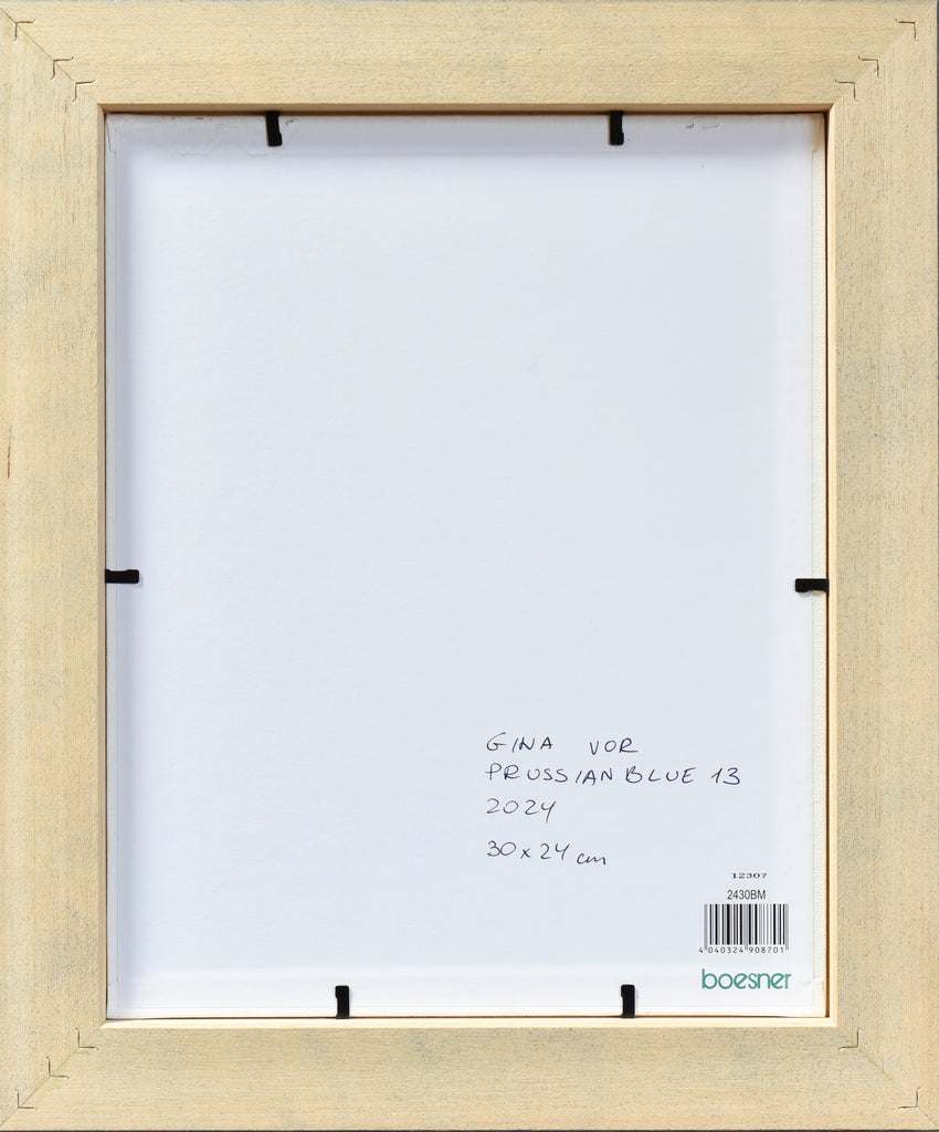 Back of the framed artwork with artist's signature on the back.