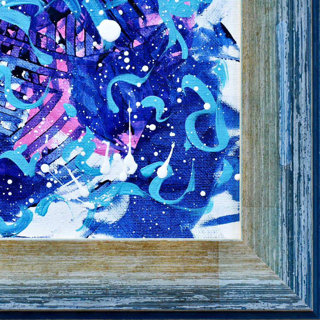 Abstract artwork with blue, purple, and white colors in a wooden frame.