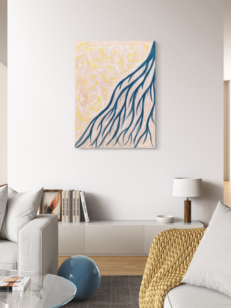 Abstract landscape art piece on a wall in a modern living room