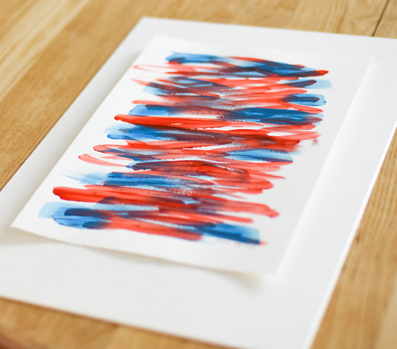 Blue and red abstract painting on paper 