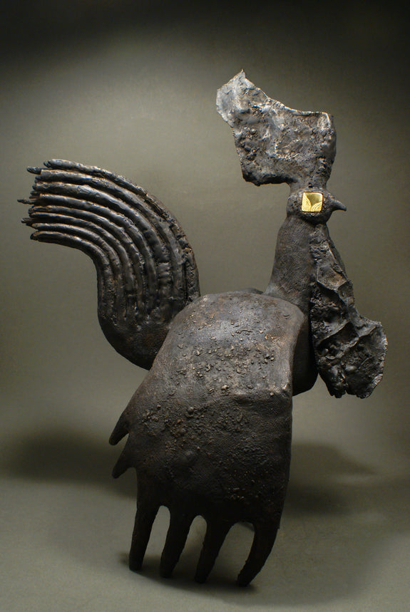 bronze sculpture of a rooster