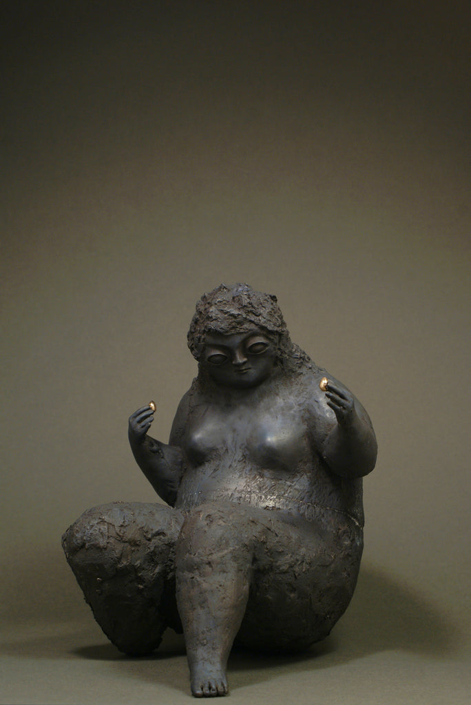 Bronze sculpture of a woman for sale